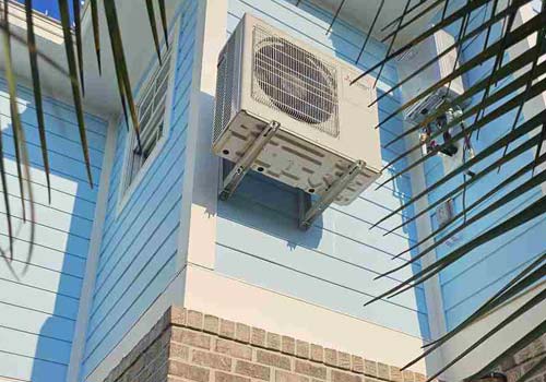 An air conditioning unit placed on the exterior of a building in Litchfield