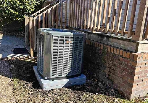 A heat pump installed outside a house for efficient heating